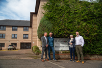 MacLehose Court, Greenock. L-R David Melvin Vice Chair of Blackwood, New Tenants Diane Scott and Karl Scott, Simon Fitzpatrick Development & Commercial Director.